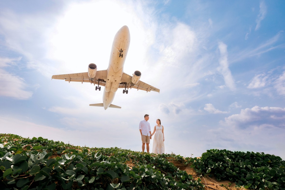 engagement photoshoot with airplane at Mai khao beach phuket