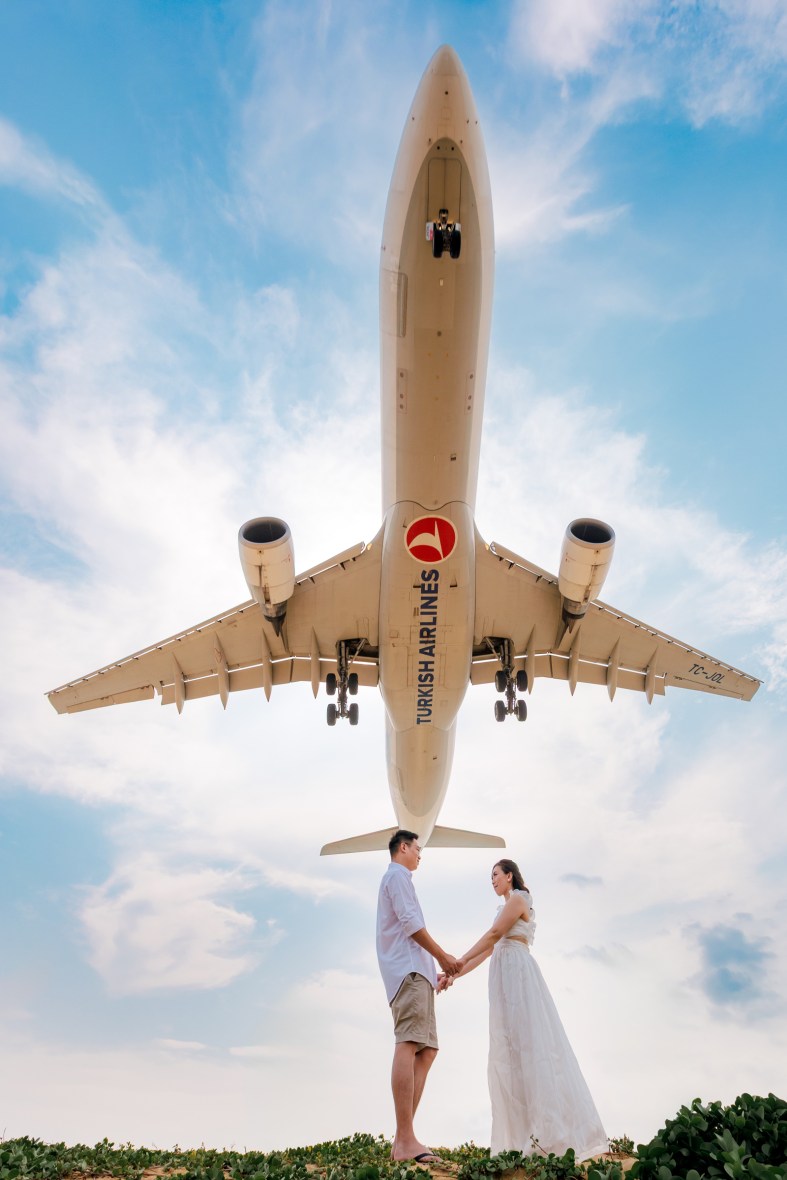 couple photoshoot with airplane at Mai khao beach