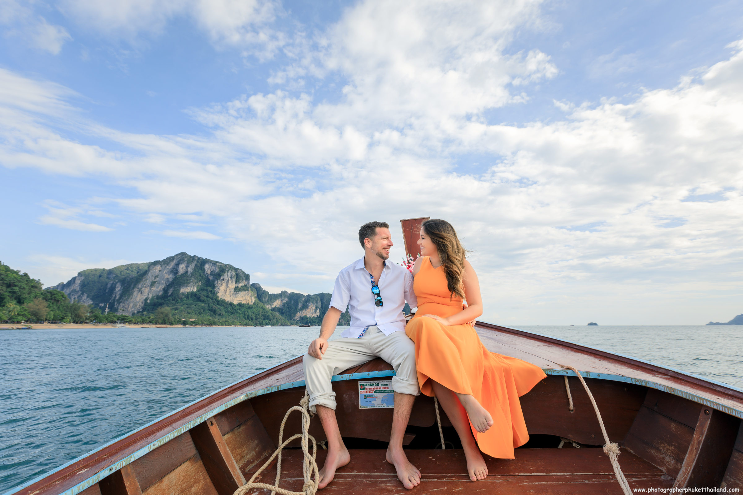 Honeymoon couple on long tail boat at Ao nang Krabi Thailand