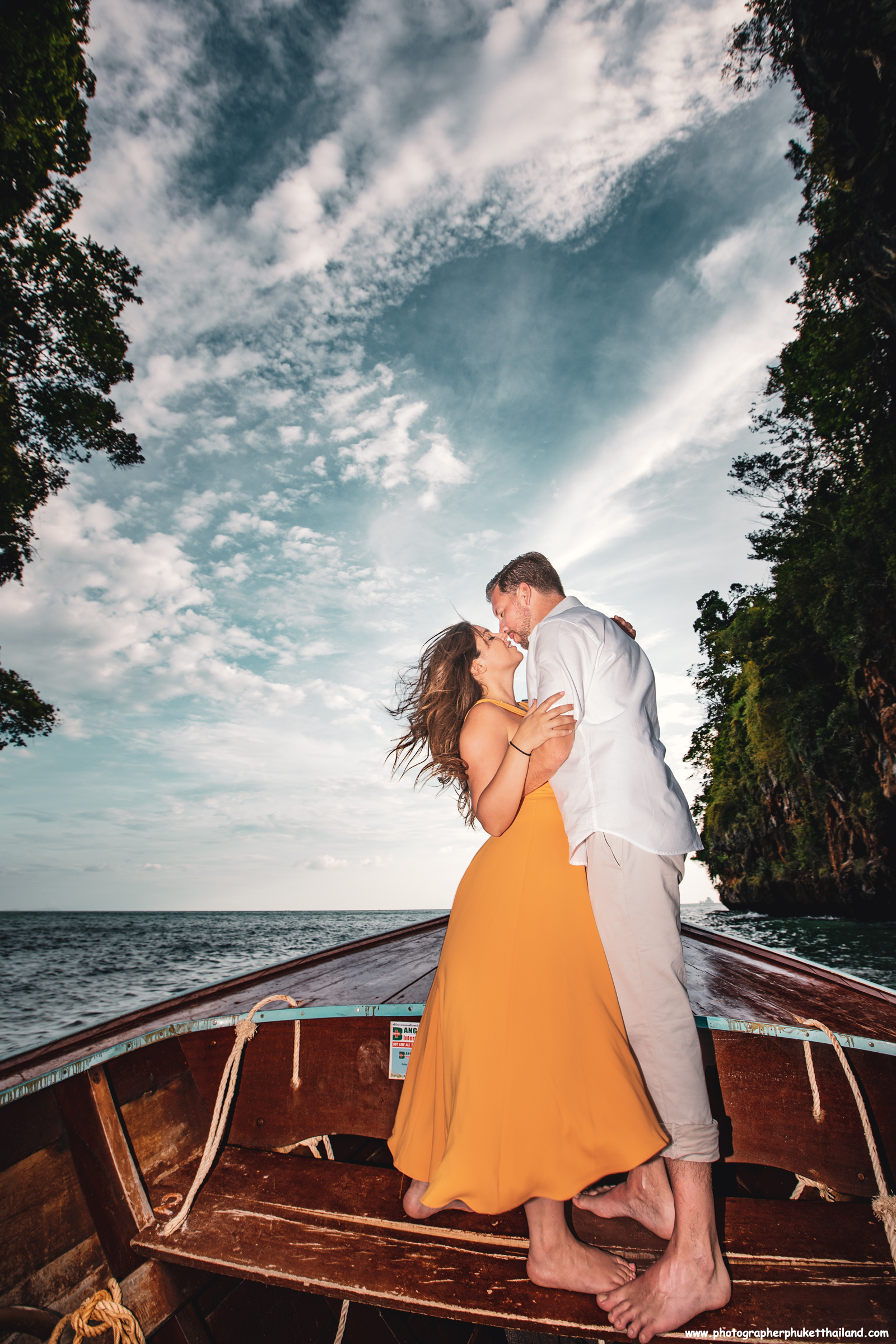 Honeymoon couple on long tail boat at Ao nang Krabi Thailand