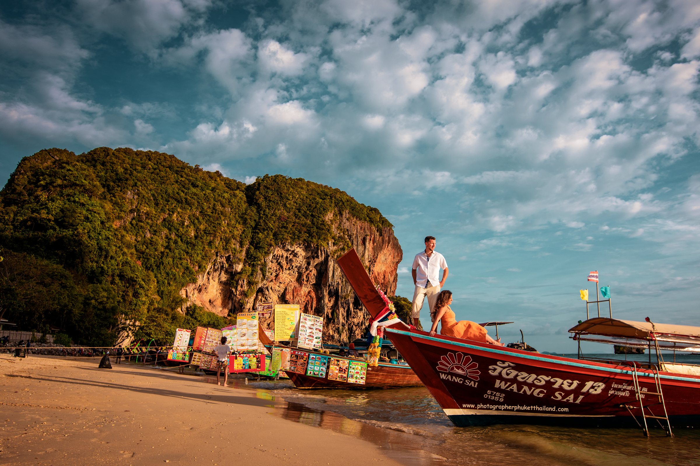 honeymoon couple photoshoot on long tail boat at Ao nang Krabi