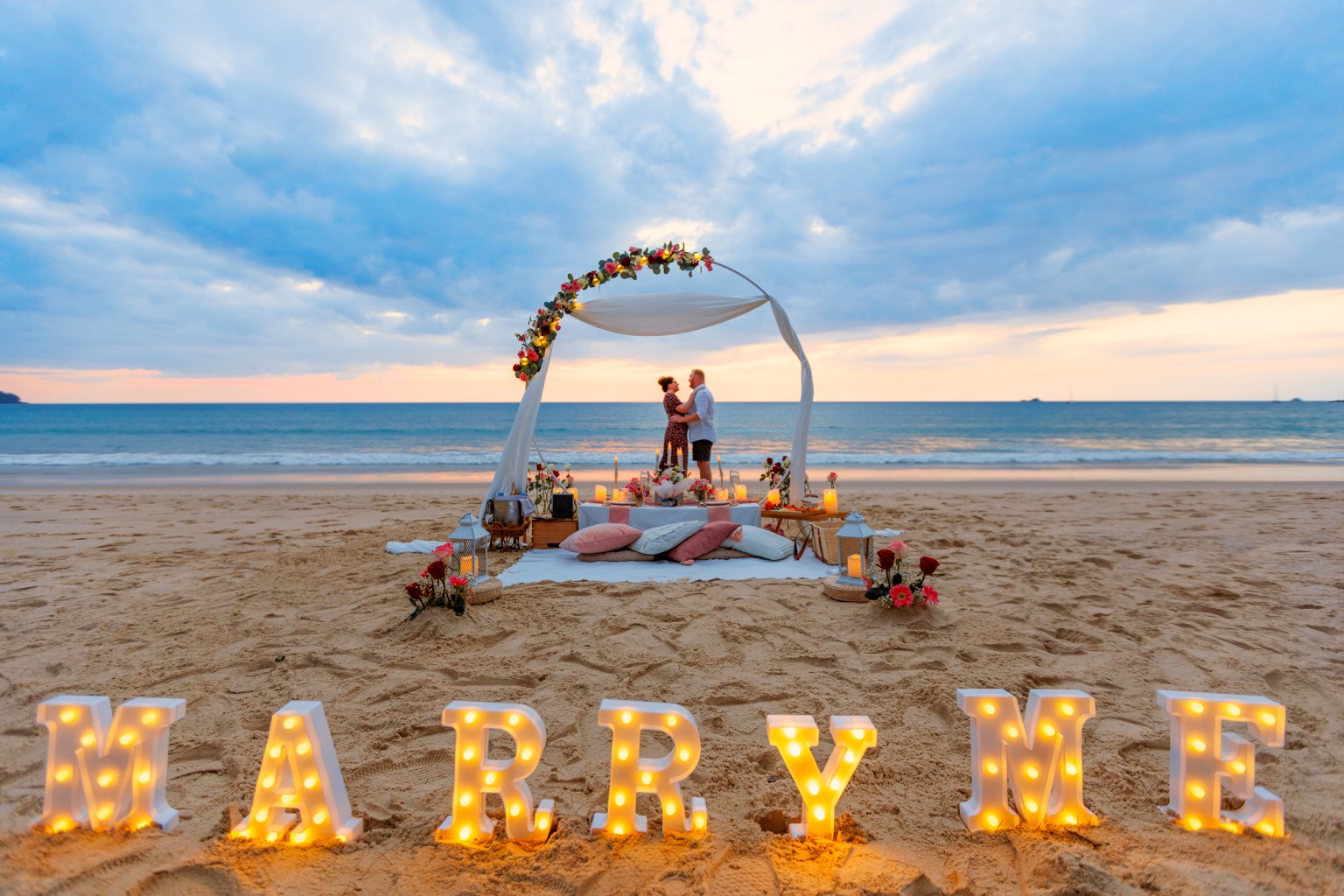 marriage proposal photoshoot as sunset at Le phang Phuket