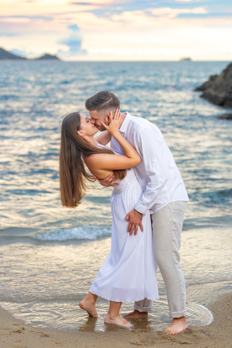 Engagement photoshoot as sunset time at kalim beach phuket