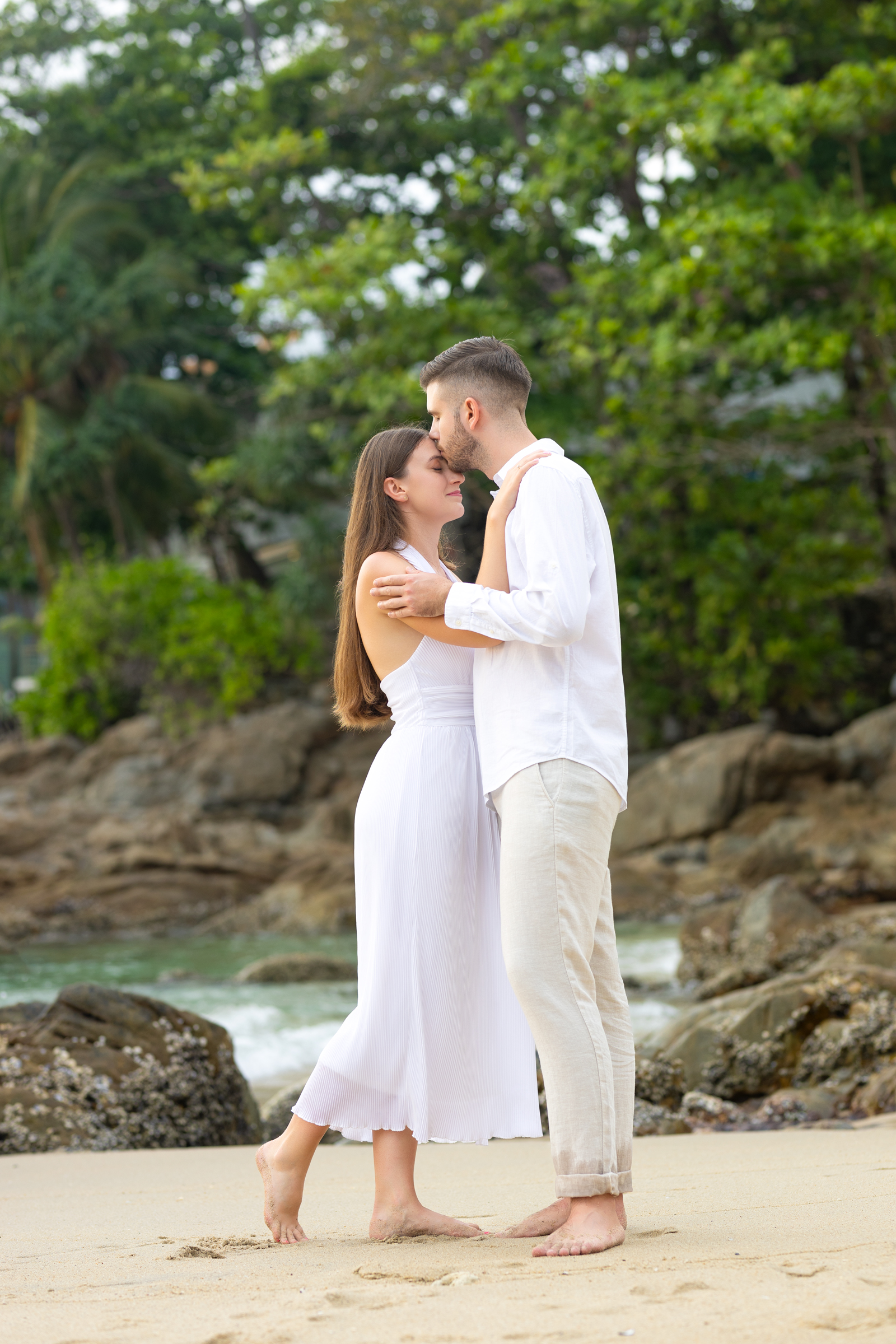 Engagement photoshoot as sunset time at kalim beach phuket