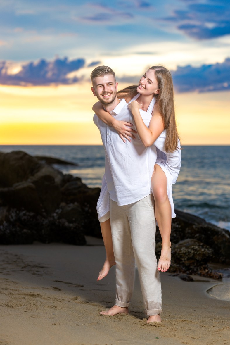 Engagement photoshoot as sunset time at kalim beach phuket