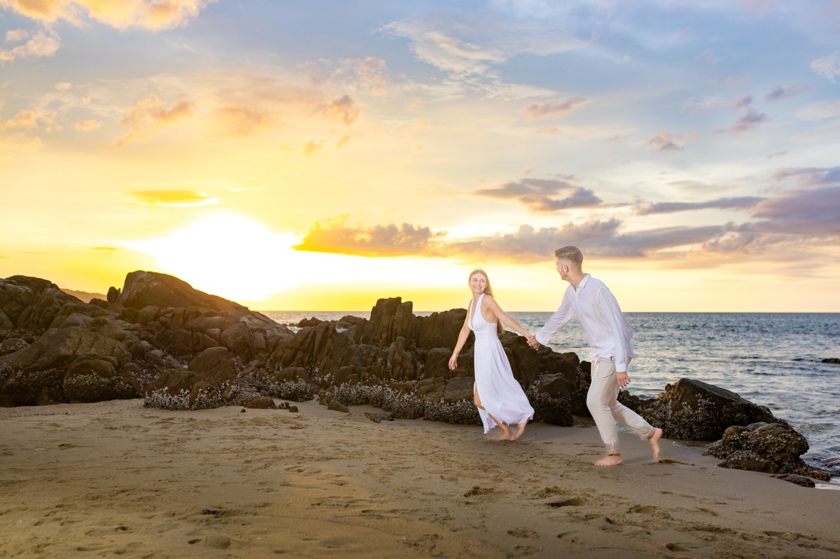 Engagement photoshoot as sunset time at kalim beach phuket
