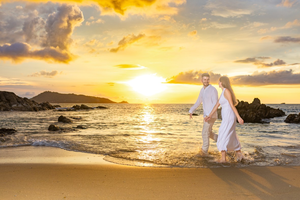 Engagement photoshoot as sunset time at kalim beach phuket