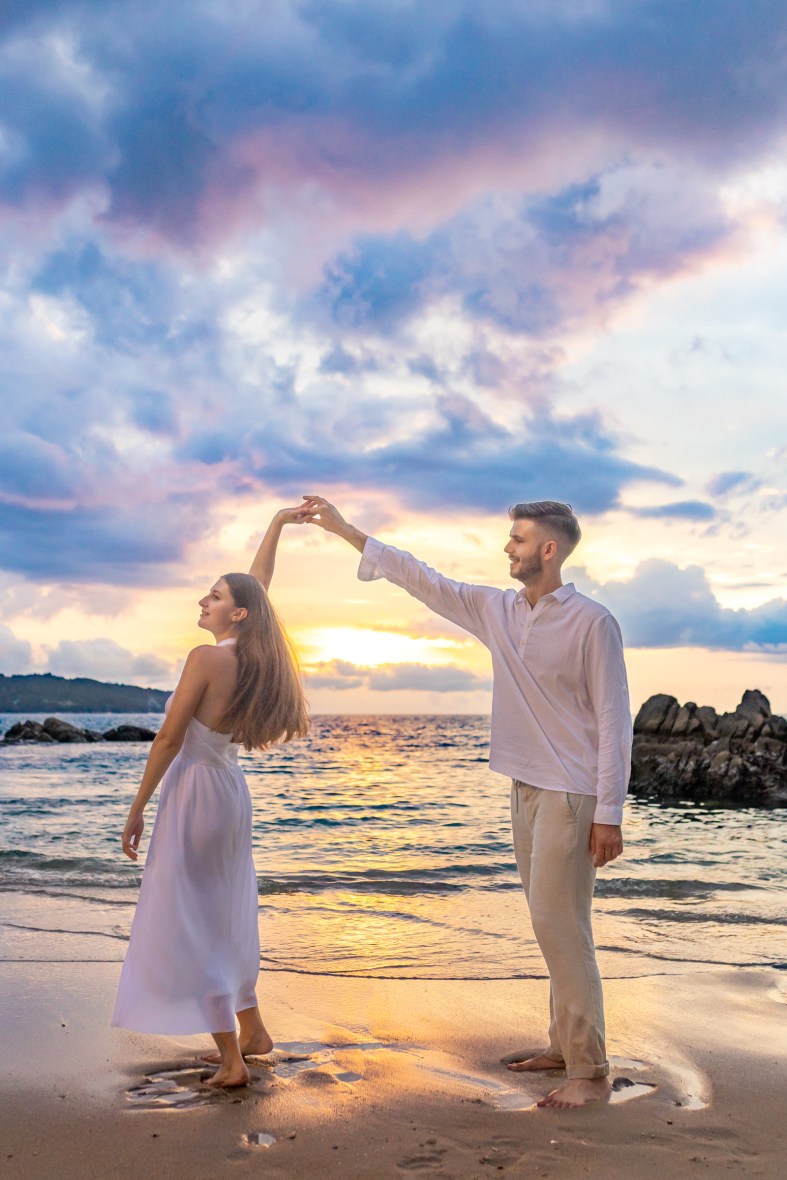 Engagement photoshoot as sunset time at kalim beach phuket