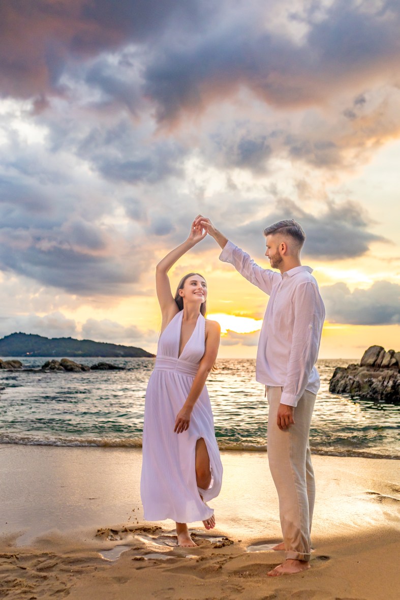 Engagement photoshoot as sunset time at kalim beach phuket
