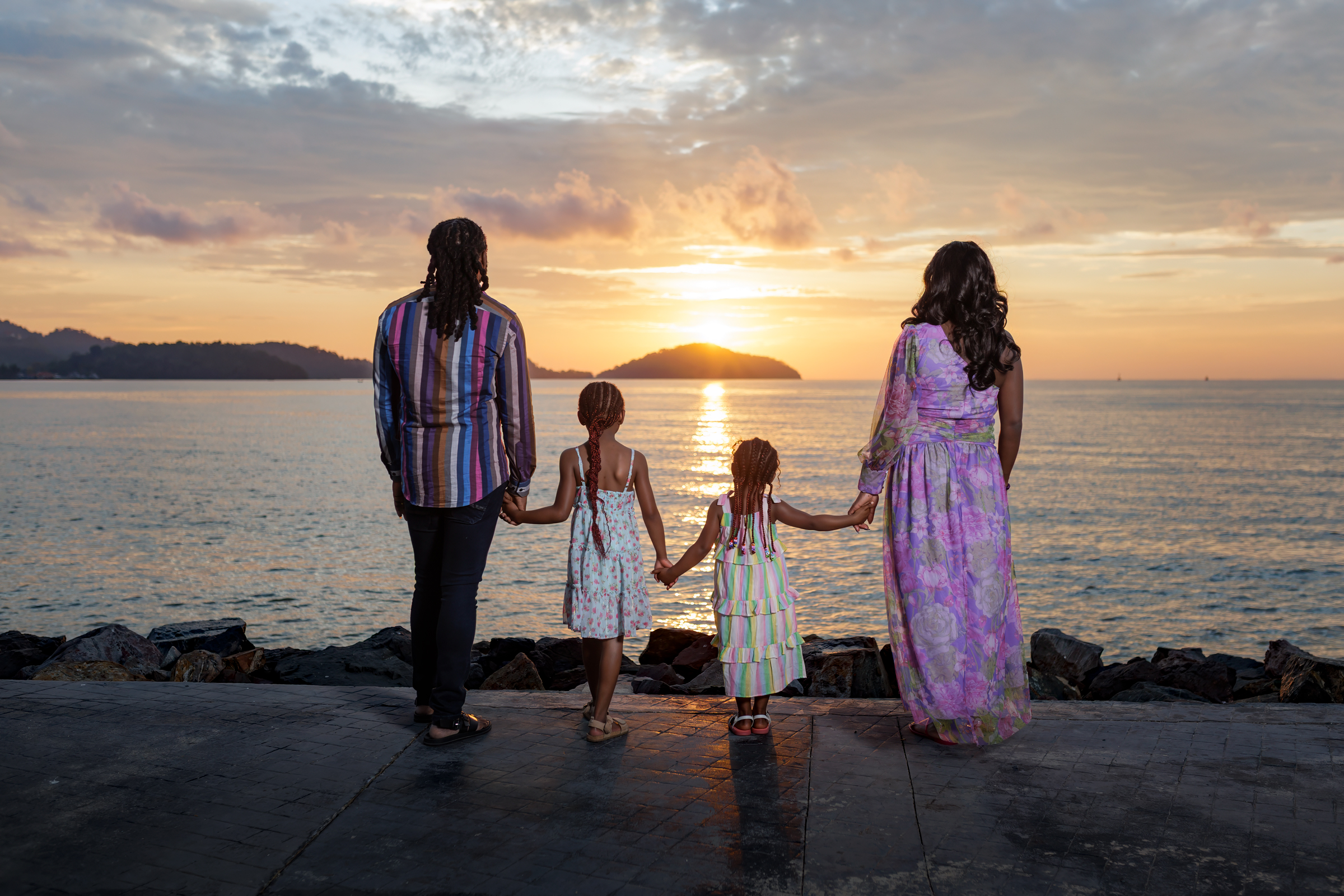 family photoshoot as sunrise at sapan hin park phuket