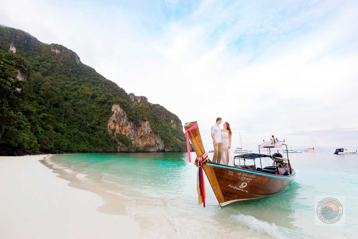 engagement photography on long tail boat at monkey bay phi phi island krabi 